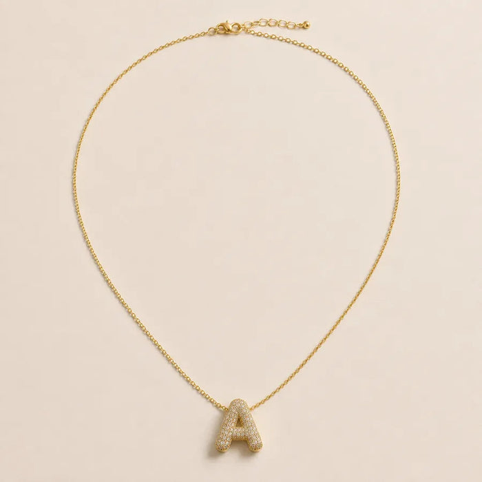 Collier initiale A, chaîne fine dorée et pendentif pavé